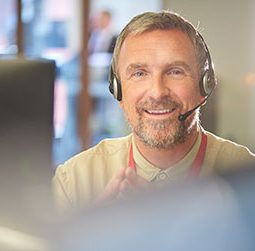 Smiling call centre man