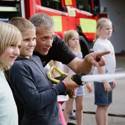 Children learning fire and rescue skills